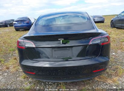 Lot #2995286020 2021 TESLA MODEL 3 STANDARD RANGE PLUS REAR-WHEEL DRIVE