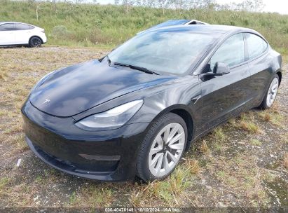 Lot #2995286020 2021 TESLA MODEL 3 STANDARD RANGE PLUS REAR-WHEEL DRIVE