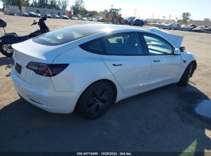 Lot #2992832608 2021 TESLA MODEL 3 STANDARD RANGE PLUS REAR-WHEEL DRIVE