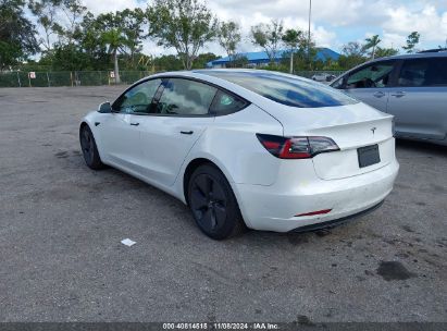 Lot #2992821429 2021 TESLA MODEL 3 STANDARD RANGE PLUS REAR-WHEEL DRIVE