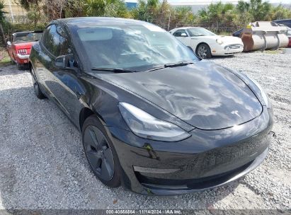 Lot #3052075688 2021 TESLA MODEL 3 STANDARD RANGE PLUS REAR-WHEEL DRIVE