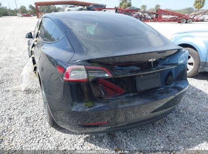 Lot #3052075688 2021 TESLA MODEL 3 STANDARD RANGE PLUS REAR-WHEEL DRIVE