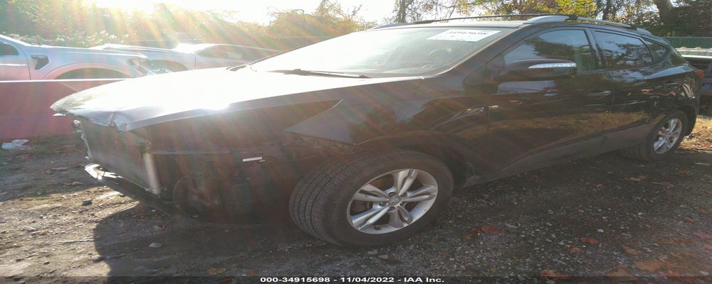 KM8JUCAC3CU404471 2012 HYUNDAI TUCSON photo no. 2