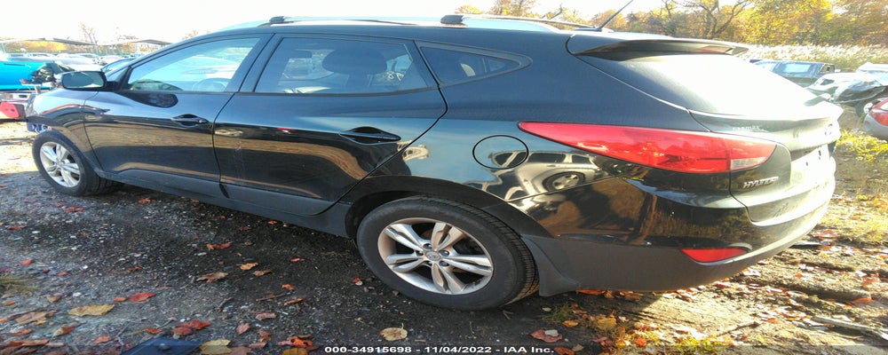 KM8JUCAC3CU404471 2012 HYUNDAI TUCSON photo no. 3