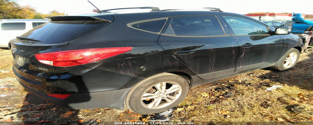 KM8JUCAC3CU404471 2012 HYUNDAI TUCSON photo no. 4