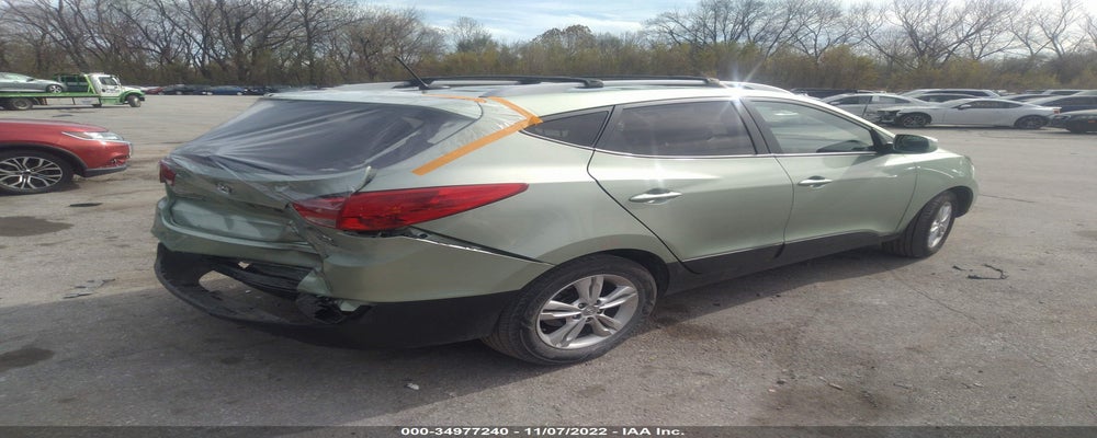 KM8JU3AC0CU396538 2012 HYUNDAI TUCSON photo no. 4