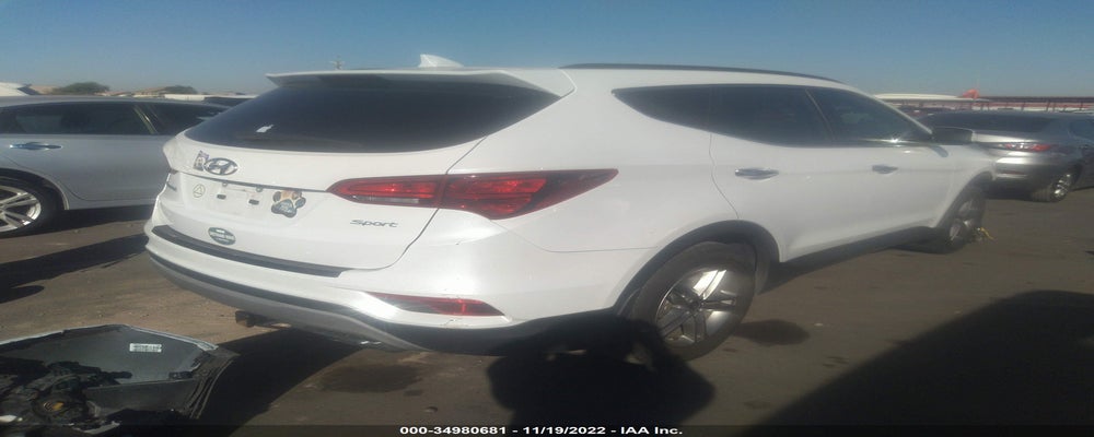 5NMZU3LB4JH098476 2018 HYUNDAI SANTA FE SPORT photo no. 4