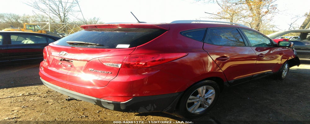KM8JU3AC0CU323069 2012 HYUNDAI TUCSON photo no. 4