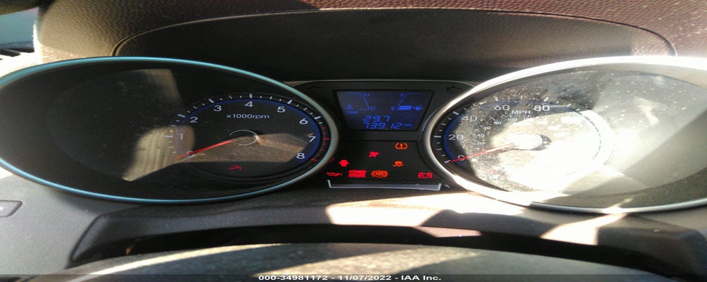 KM8JU3AC0CU323069 2012 HYUNDAI TUCSON photo no. 7