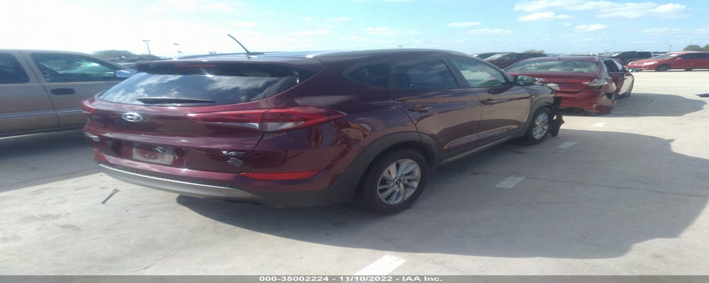 KM8J33A21GU026859 2016 HYUNDAI TUCSON photo no. 4