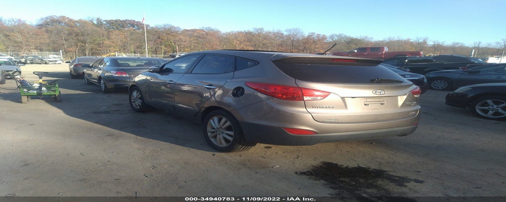 KM8JUCAC4DU644050 2013 HYUNDAI TUCSON photo no. 3