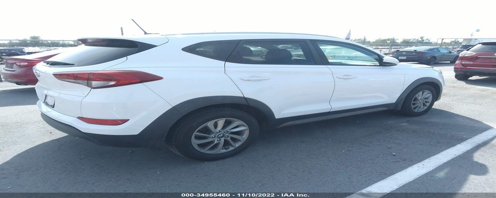 KM8J33A40GU174048 2016 HYUNDAI TUCSON photo no. 4