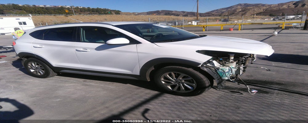 KM8J33A4XJU677108 2018 HYUNDAI TUCSON photo no. 4