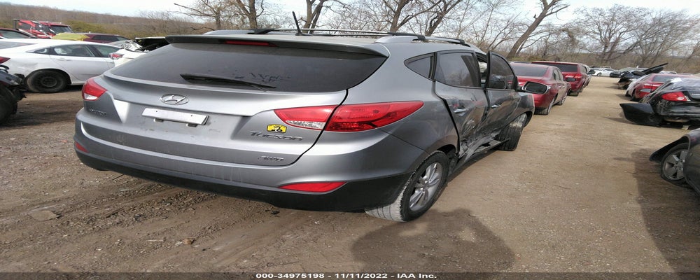 KM8JUCAC0CU397396 2012 HYUNDAI TUCSON photo no. 4