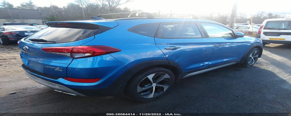 KM8J3CA25HU368008 2017 HYUNDAI TUCSON photo no. 4