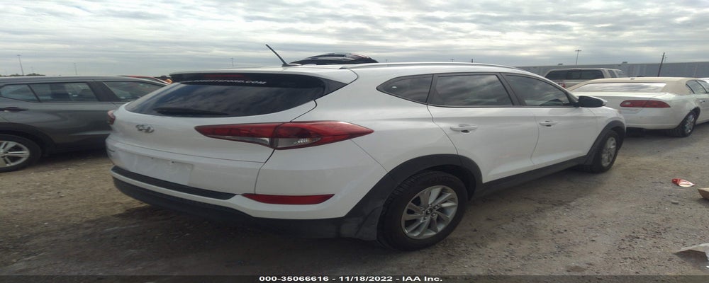 KM8J33A47GU232446 2016 HYUNDAI TUCSON photo no. 4