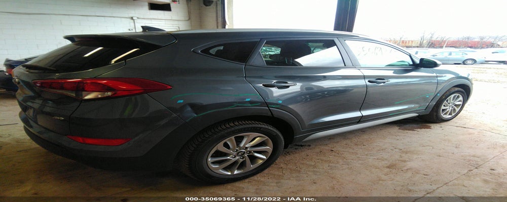 KM8J3CA43JU734801 2018 HYUNDAI TUCSON photo no. 4