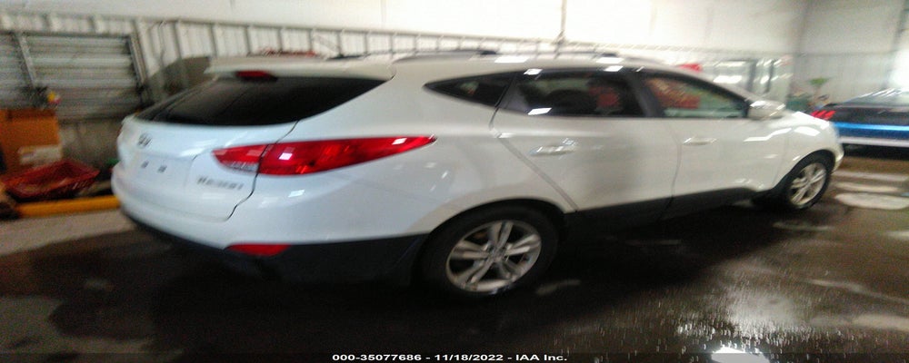 KM8JU3AC3CU487738 2012 HYUNDAI TUCSON photo no. 4