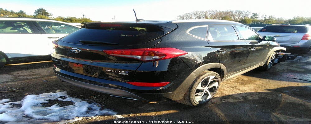 KM8J3CA22GU238699 2016 HYUNDAI TUCSON photo no. 4