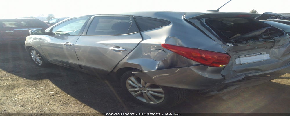KM8JUCAC8DU722121 2013 HYUNDAI TUCSON photo no. 3