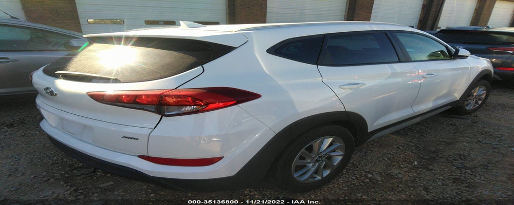 KM8J3CA40JU797631 2018 HYUNDAI TUCSON photo no. 4