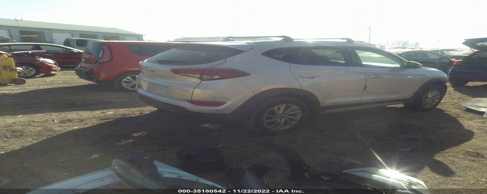 KM8J3CA49JU717131 2018 HYUNDAI TUCSON photo no. 4