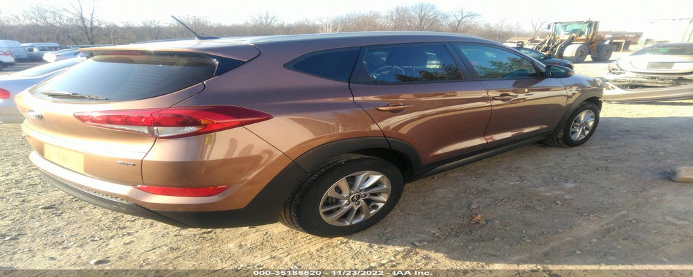 KM8J3CA49GU230052 2016 HYUNDAI TUCSON photo no. 4