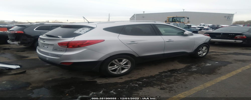 KM8JUCAC7CU445962 2012 HYUNDAI TUCSON photo no. 4