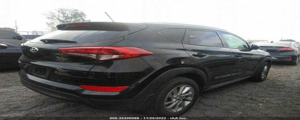KM8J33A49HU268091 2017 HYUNDAI TUCSON photo no. 4