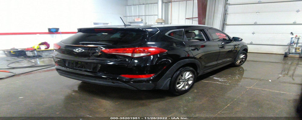 KM8J33A43GU164873 2016 HYUNDAI TUCSON photo no. 4