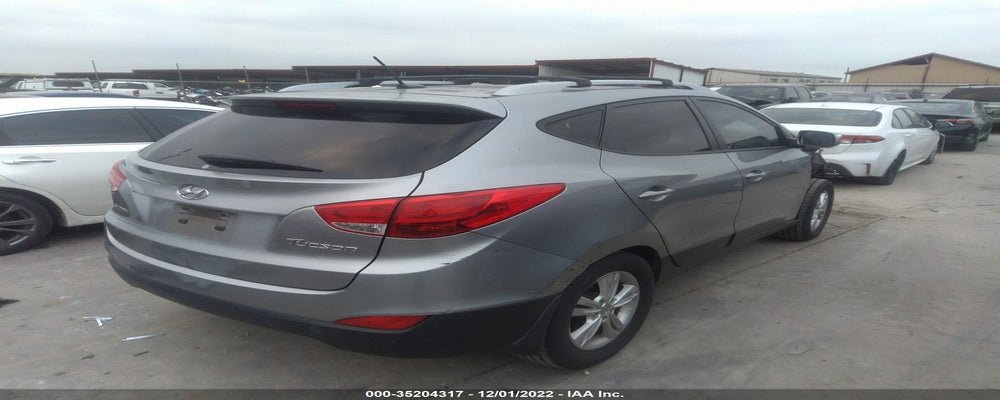 KM8JU3AC7CU423167 2012 HYUNDAI TUCSON photo no. 4