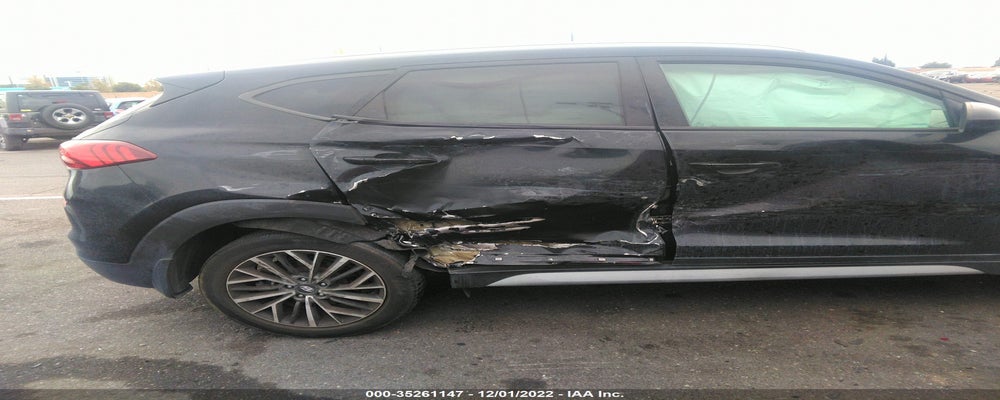 KM8J33AL2KU971014 2019 HYUNDAI TUCSON photo no. 6