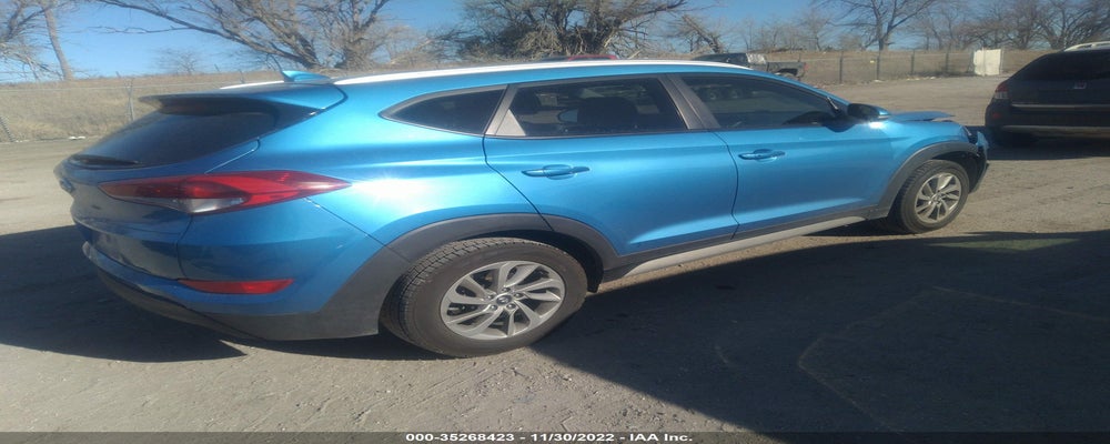 KM8J3CA45JU634490 2018 HYUNDAI TUCSON photo no. 4