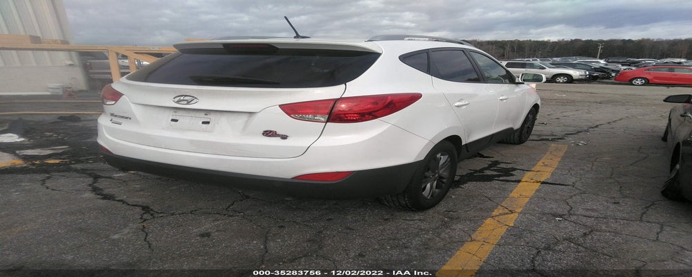 KM8JU3AG7EU897576 2014 HYUNDAI TUCSON photo no. 4