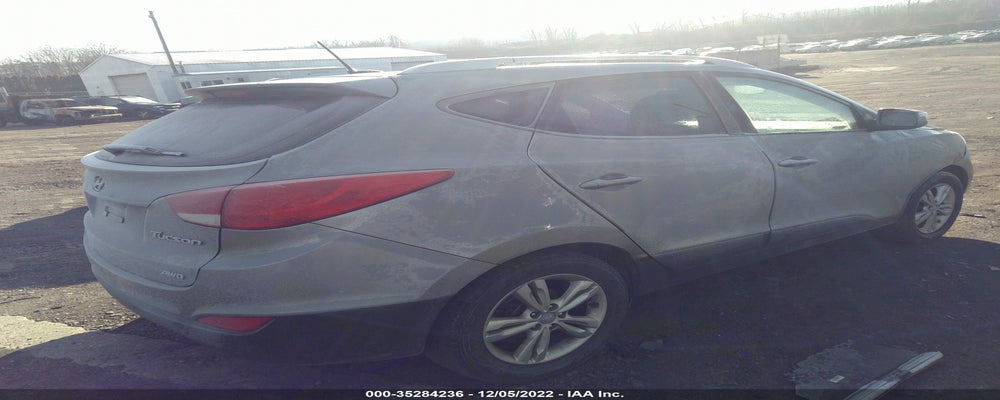 KM8JUCAC4DU709334 2013 HYUNDAI TUCSON photo no. 4