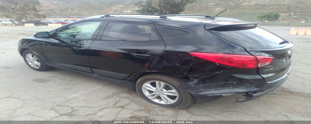 KM8JU3AC5CU324377 2012 HYUNDAI TUCSON photo no. 3