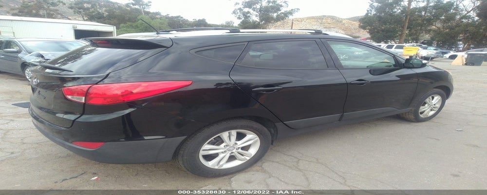 KM8JU3AC5CU324377 2012 HYUNDAI TUCSON photo no. 4