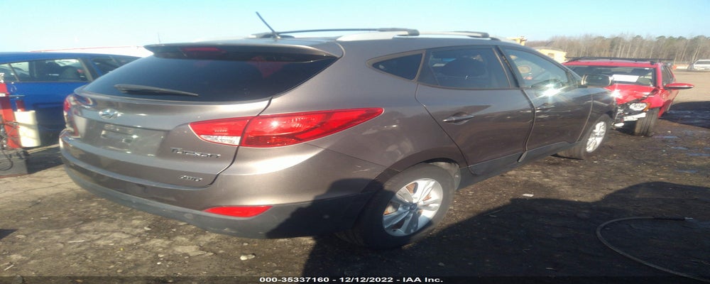 KM8JUCAC6CU433303 2012 HYUNDAI TUCSON photo no. 4
