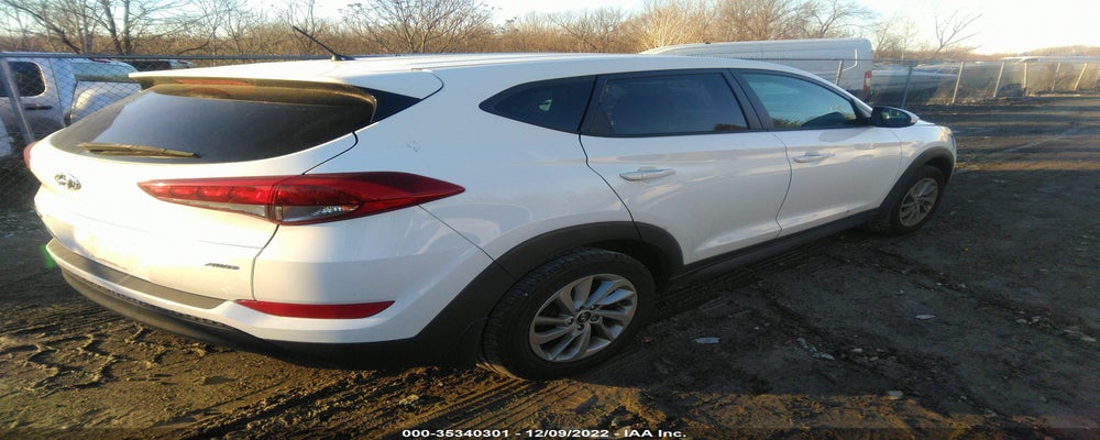KM8J2CA42JU765217 2018 HYUNDAI TUCSON photo no. 4