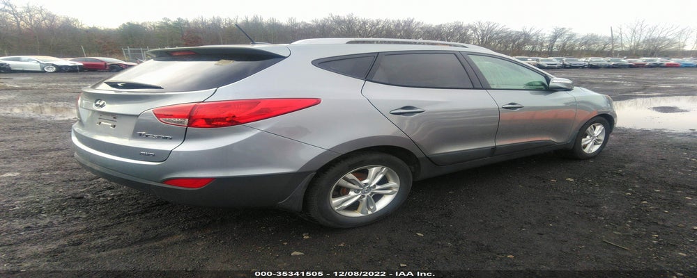 KM8JUCAC1CU346411 2012 HYUNDAI TUCSON photo no. 4
