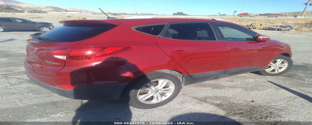 KM8JU3AC7CU472739 2012 HYUNDAI TUCSON photo no. 4