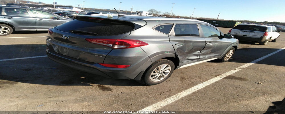 KM8J3CA42HU574954 2017 HYUNDAI TUCSON photo no. 4