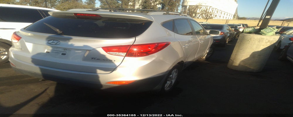 KM8JU3AC9CU518460 2012 HYUNDAI TUCSON photo no. 4