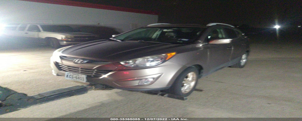 KM8JUCAC8DU555128 2013 HYUNDAI TUCSON photo no. 2