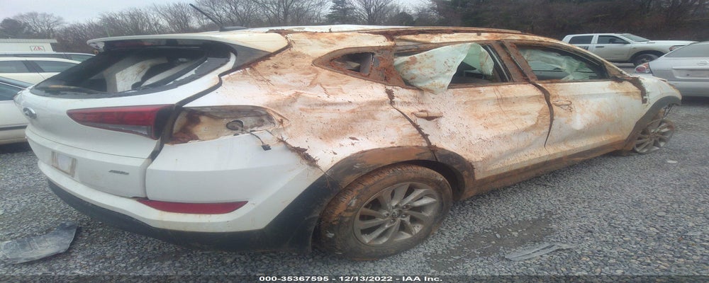 KM8J3CA4XGU249693 2016 HYUNDAI TUCSON photo no. 4