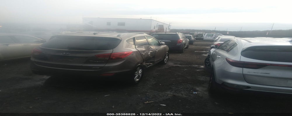 KM8JUCAC4DU598817 2013 HYUNDAI TUCSON photo no. 4