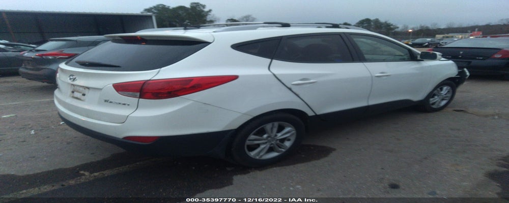 KM8JU3AC5CU468494 2012 HYUNDAI TUCSON photo no. 4