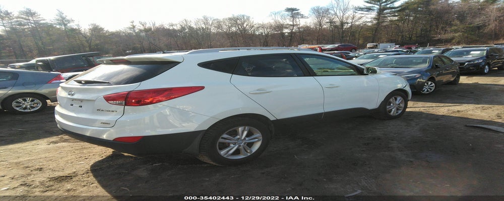 KM8JUCAC3CU532743 2012 HYUNDAI TUCSON photo no. 4