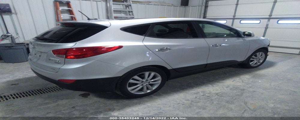 KM8JUCAC5DU634028 2013 HYUNDAI TUCSON photo no. 4