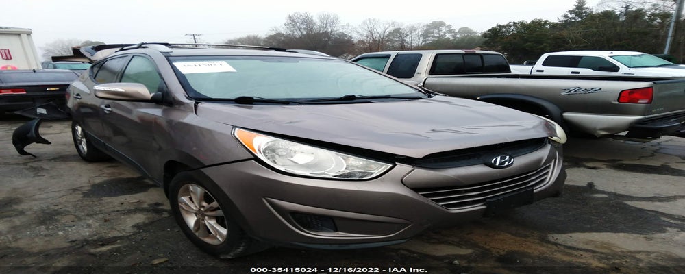 KM8JU3AC7CU460901 2012 HYUNDAI TUCSON photo no. 24
